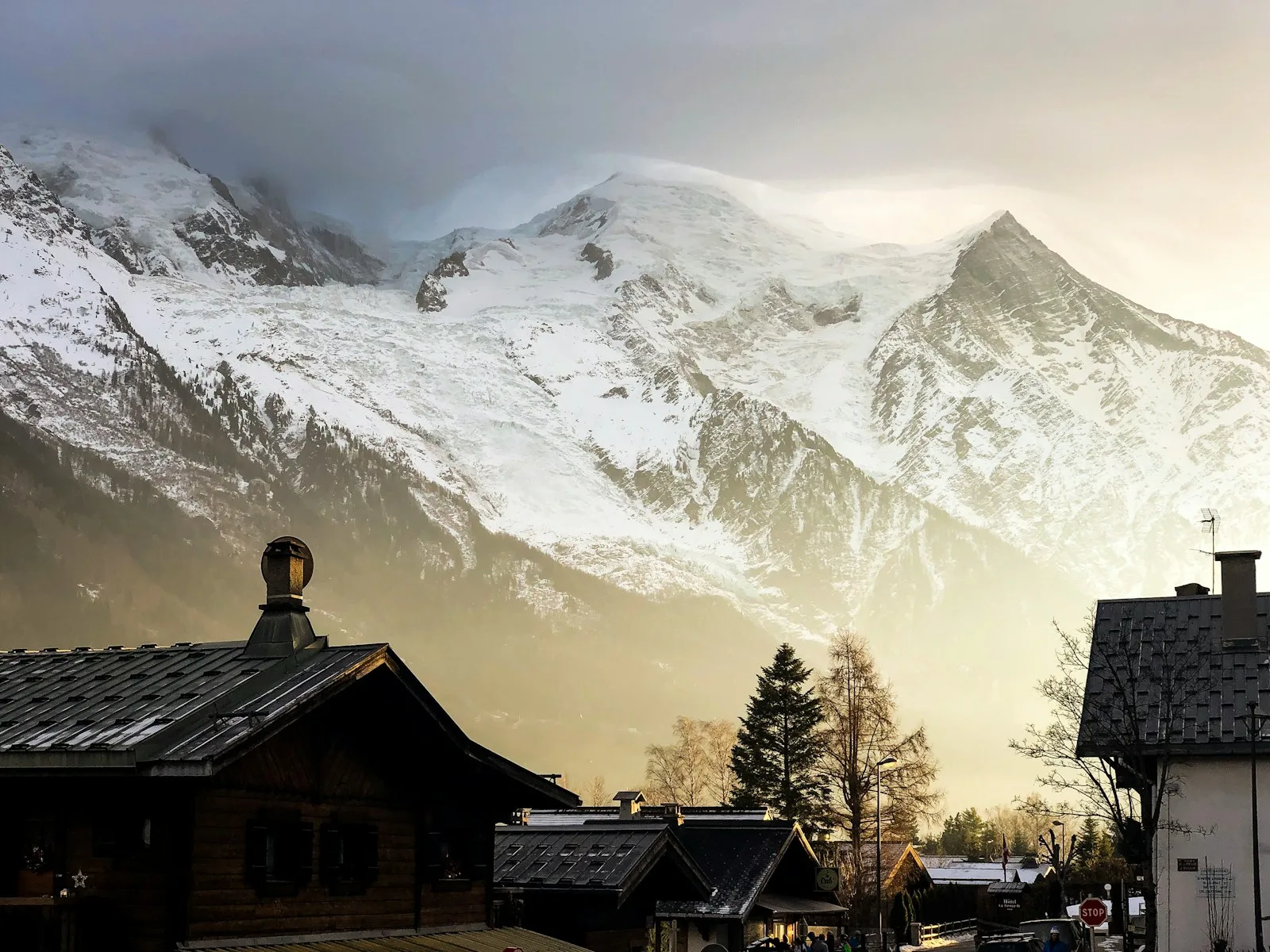 houses facing snow-covered mountains